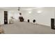 Finished basement is ideal for media or recreation room with recessed lights and neutral carpet at 10587 Proposal Pointe Way, Fishers, IN 46040