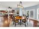 View of dining room and kitchen featuring an open concept and beautiful natural light at 10587 Proposal Pointe Way, Fishers, IN 46040