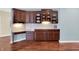 Built-in cabinets, drawers and counter space with wood floor at 10587 Proposal Pointe Way, Fishers, IN 46040