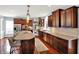 Kitchen features stainless steel appliances, custom cabinets, and light countertops at 10587 Proposal Pointe Way, Fishers, IN 46040