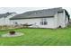 Well-maintained backyard with a hammock and a fire pit at 1059 Wild Ivy Trl, Franklin, IN 46131