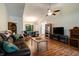 Spacious living room flowing into the dining area and kitchen at 1059 Wild Ivy Trl, Franklin, IN 46131