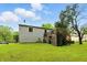 Home exterior with a wooden deck overlooking a spacious yard, perfect for outdoor enjoyment at 1103 Rosengarten Dr, Greenwood, IN 46142