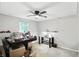 Spacious finished basement with ceiling fan and window at 1103 Rosengarten Dr, Greenwood, IN 46142