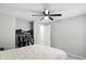 Neutral bedroom featuring a ceiling fan and an open closet for ample storage at 1103 Rosengarten Dr, Greenwood, IN 46142