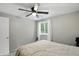 Cozy bedroom with a ceiling fan and a window providing natural light at 1103 Rosengarten Dr, Greenwood, IN 46142
