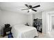 Bedroom featuring a ceiling fan, neutral decor, closet and natural light at 1103 Rosengarten Dr, Greenwood, IN 46142