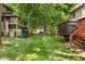 Shared backyard with view of other units' back decks, lawn, and driveway at 11529 Sunset Cove Ln # 11529, Indianapolis, IN 46236