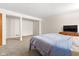 Relaxing bedroom featuring neutral colors, comfortable carpet and good closet space at 11529 Sunset Cove Ln # 11529, Indianapolis, IN 46236