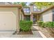 Charming home featuring a welcoming front entrance with well-maintained landscaping and inviting curb appeal at 11529 Sunset Cove Ln # 11529, Indianapolis, IN 46236