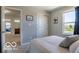 Relaxing bedroom with closet doors and view of large backyard at 12584 Cold Stream Rd, Noblesville, IN 46060