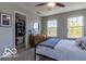 Bright bedroom with walk-in closet, multiple windows, and stylish decor at 12584 Cold Stream Rd, Noblesville, IN 46060