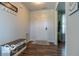 Inviting entryway with wood floors, a storage bench, and welcome sign decor at 12584 Cold Stream Rd, Noblesville, IN 46060