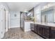 Bathroom featuring a glass enclosed shower, modern vanity, and stylish tile flooring at 12634 Mustard Seed Ct, Fishers, IN 46038