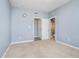 Bedroom featuring plush carpet, neutral wall color, and an ensuite bathroom at 12634 Mustard Seed Ct, Fishers, IN 46038