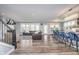 Open concept living room featuring hardwood floors and lots of natural light at 12634 Mustard Seed Ct, Fishers, IN 46038
