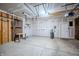 Spacious garage with a white garage door and plenty of storage space for tools and equipment at 1336 Danielle Rd, Lebanon, IN 46052