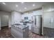 Stylish kitchen featuring granite countertops, stainless steel appliances, and white cabinetry at 1336 Danielle Rd, Lebanon, IN 46052