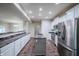 Modern kitchen with stainless steel appliances, granite countertops, and a center island with sink at 1336 Danielle Rd, Lebanon, IN 46052