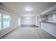 Expansive living room with a combination of carpet and wood floors and natural light at 1336 Danielle Rd, Lebanon, IN 46052