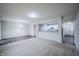 Spacious living area with plush carpeting and hardwood flooring, opening to a modern kitchen at 1336 Danielle Rd, Lebanon, IN 46052