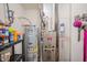 Utilities feature hot water heater, furnace, and other equipment on shelf and against wall at 1336 Danielle Rd, Lebanon, IN 46052