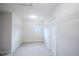 Spacious walk-in closet with carpet and white shelving offers ample storage space and a window for natural light at 1336 Danielle Rd, Lebanon, IN 46052