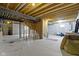 Unfinished basement with exposed wood ceiling, and concrete flooring, awaiting personalization at 13624 Alston Dr, Fishers, IN 46037