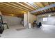 Unfinished basement with exposed ceiling and concrete floor offers potential for customization at 13624 Alston Dr, Fishers, IN 46037