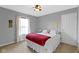 Comfortable bedroom featuring carpet, a ceiling fan, and window at 13624 Alston Dr, Fishers, IN 46037