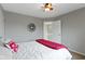 Bedroom featuring carpet, a ceiling fan, and open door to hallway at 13624 Alston Dr, Fishers, IN 46037