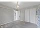 Bedroom with carpet, closet, chandelier, and open door to hallway at 13624 Alston Dr, Fishers, IN 46037
