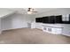 A bonus room with wall mounted TVs at 13624 Alston Dr, Fishers, IN 46037