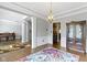 Open dining area with hardwood floors and architectural details provides versatile layout at 13624 Alston Dr, Fishers, IN 46037