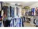 The walk-in closet offers ample hanging and shelving space for organized storage at 13624 Alston Dr, Fishers, IN 46037
