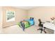 A bedroom featuring a cozy bed and a small study desk at 13700 Stanford Dr, Carmel, IN 46074