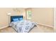 Cozy bedroom with a bright window, a soft bed, and calming decor at 13700 Stanford Dr, Carmel, IN 46074