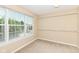 Modest bedroom with a large window and wire shelving at 13700 Stanford Dr, Carmel, IN 46074