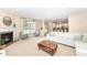 Open-concept living space featuring fireplace and view of the kitchen at 13700 Stanford Dr, Carmel, IN 46074