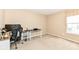 Office space with desk, computer, chair, and good natural light at 13700 Stanford Dr, Carmel, IN 46074