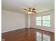 Bedroom with hardwood floors, lots of light and a ceiling fan at 14523 Lee Stewart Ln, Fishers, IN 46038