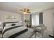 Beautiful bedroom featuring updated decor, hardwood floors, and lots of natural light at 14523 Lee Stewart Ln, Fishers, IN 46038