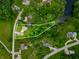 Stunning aerial view of property with mature trees, pond, and detailed boundary lines at 155 Hoover Dr, , IN 46164