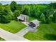 Lovely home featuring mature trees, a detached garage, and well-maintained landscaping at 155 Hoover Dr, , IN 46164