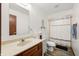 Bathroom with a sink, toilet, and shower/tub combo at 155 Hoover Dr, , IN 46164