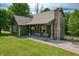 Charming home with a cozy covered porch, brick chimney, complemented by mature trees at 155 Hoover Dr, , IN 46164
