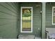 Charming home exterior showcasing an inviting front porch with a welcome wreath and wooden bench at 155 Hoover Dr, , IN 46164