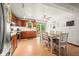 Eat-in kitchen with wooden cabinets, stainless steel appliances, and access to the back deck at 155 Hoover Dr, , IN 46164