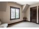 Bedroom featuring neutral walls, cozy furniture, and a bright window view at 18 Lost Run Ln, Zionsville, IN 46077