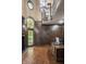 Elegant home office with wood paneled walls, beautiful wood floors and lots of natural light at 18 Lost Run Ln, Zionsville, IN 46077